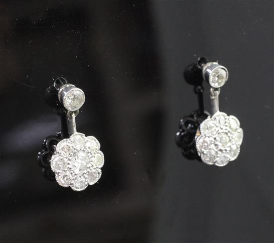 A pair of mid 20th century white gold and diamond cluster drop earrings, overall 16mm.